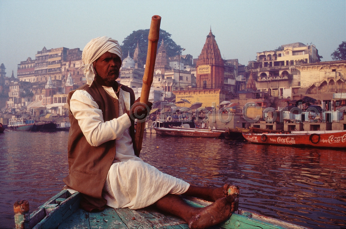 Boatman on the Holy River Ganges (Ganga), Varanasi (Benares), India
 (cod:India 07)
